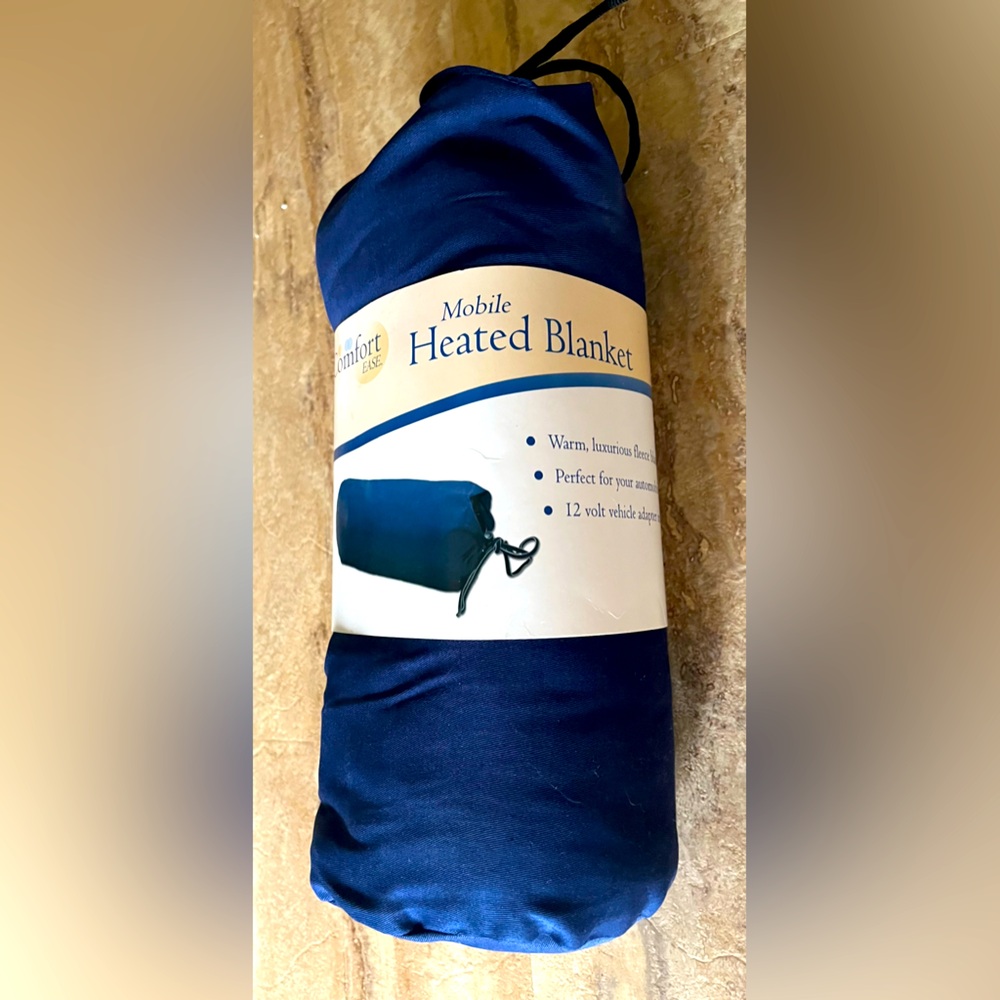 Mobile Heated blanket with 12 volt vehicle power adapter. New with tags.